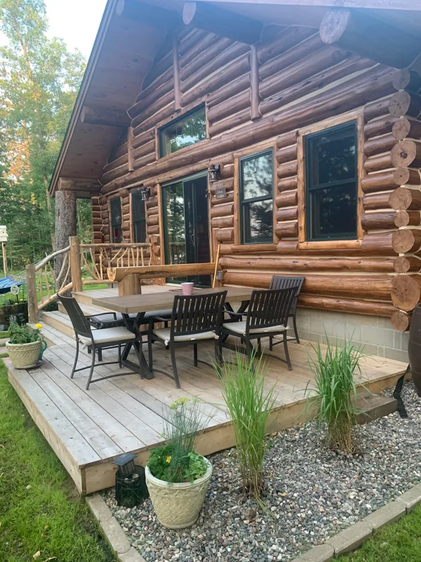 Log wall and deck supports during exterior repair